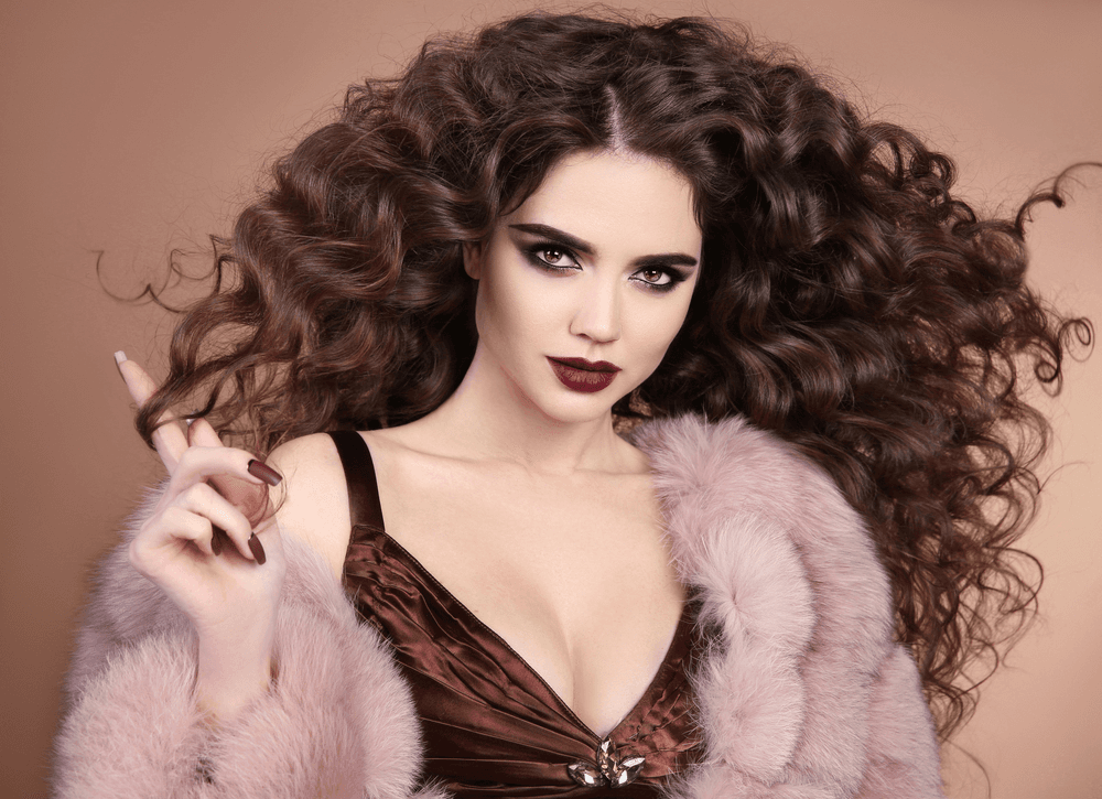Get Some Gorgeous Textured Curls With A Trendy Permed Look